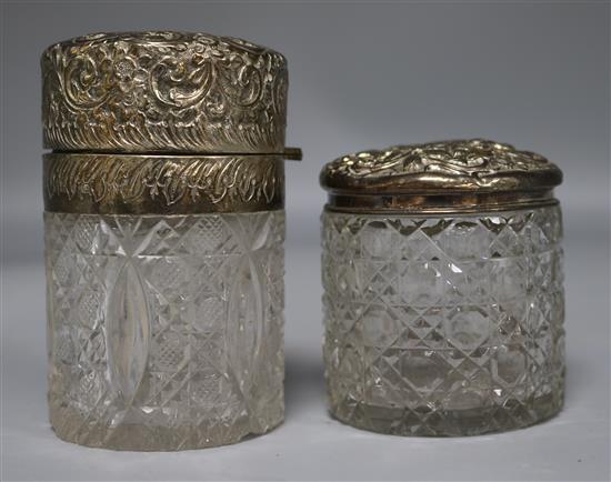 A Victorian silver mounted cylindrical glass toilet jar and another